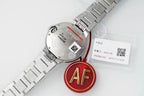 Cartier watch caseback view with steel bracelet and red AF charm; paperwork card