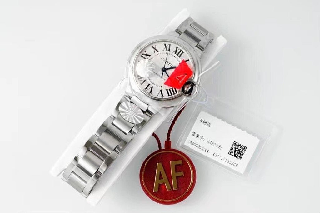 Cartier watch front view, silver bracelet, white dial, red AF tag, paperwork