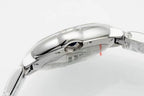 Cartier wristwatch close-up of silver case and bezel