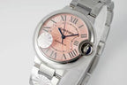 Cartier wristwatch with light pink dial, roman numerals, and silver metal bracelet