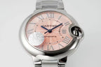 Cartier watch front close-up with light pink dial and silver metal bracelet