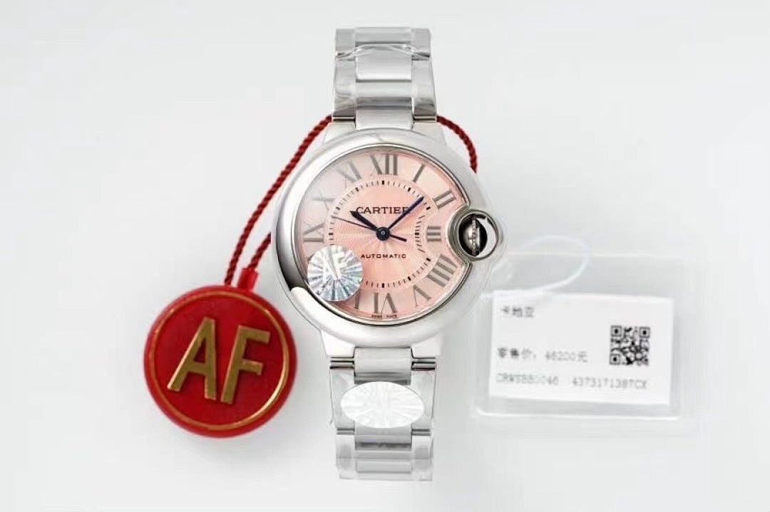Cartier automatic wristwatch with silver metal bracelet, pink dial, and AF tag