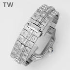 Diamond-encrusted wristwatch with full metal bracelet, angled side view showing clasp area.