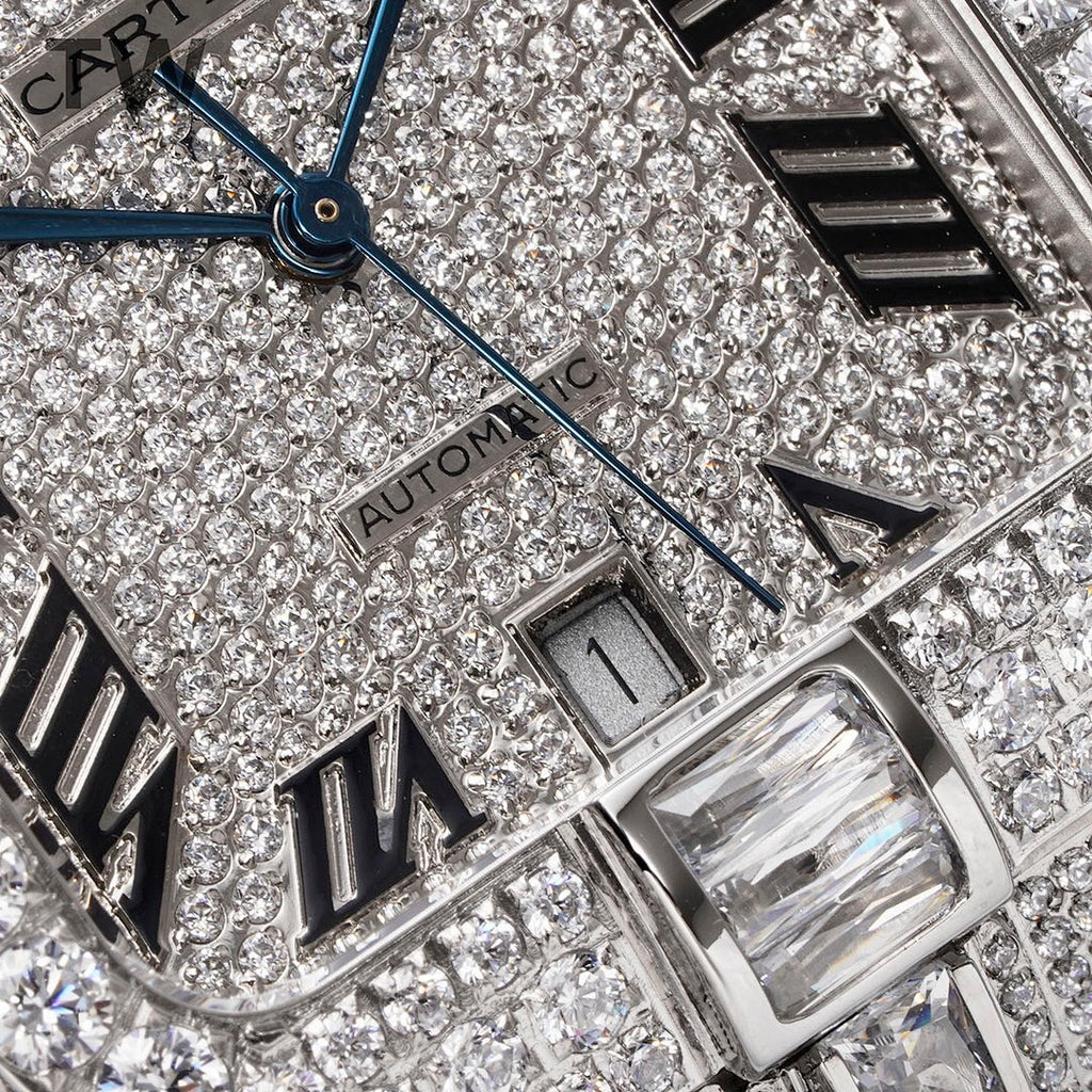 Close-up of diamond dial with Roman numerals, blue hands, and watch crown details.