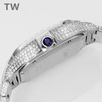 Cartier wristwatch bezel with blue sapphire detail surrounded by diamonds, silver-tone case