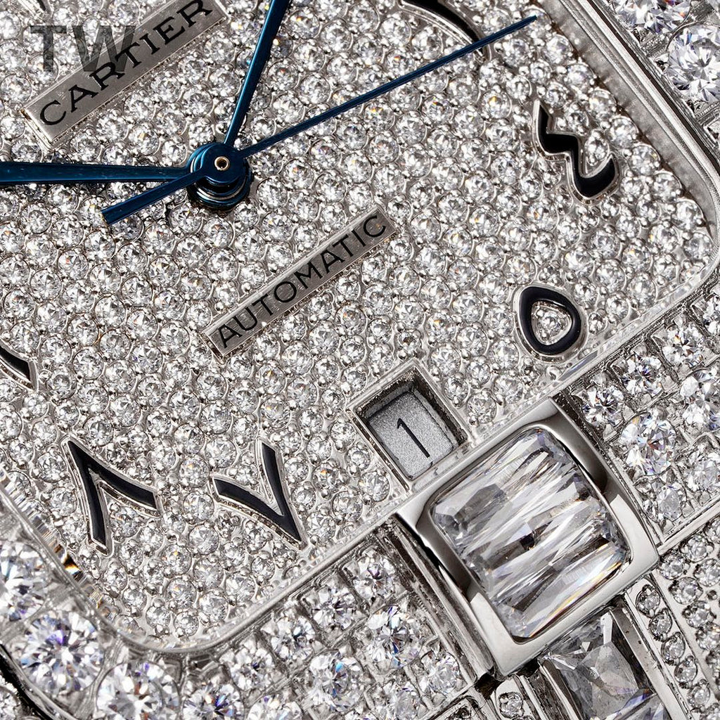 Cartier wristwatch dial close-up with blue "AUTOMATIC" text and diamond hour markers