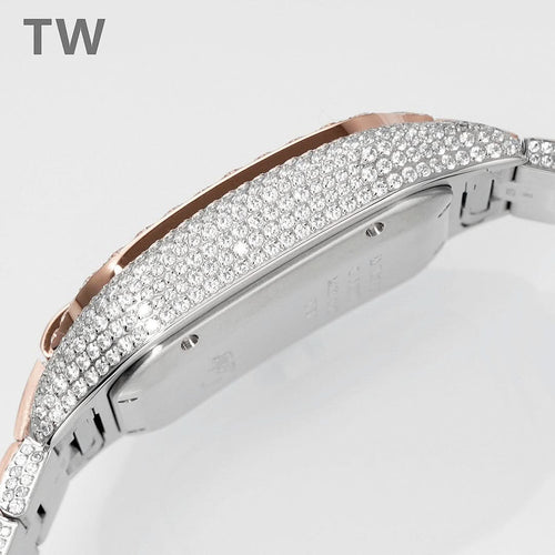 Cartier diamond watch case side view, silver dial center, rose-gold bezel, link bracelet