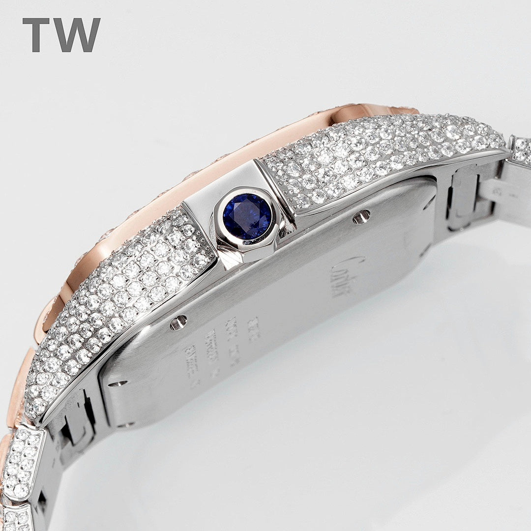 Cartier diamond watch side view with blue gem crown, rose-gold accents, studded bezel