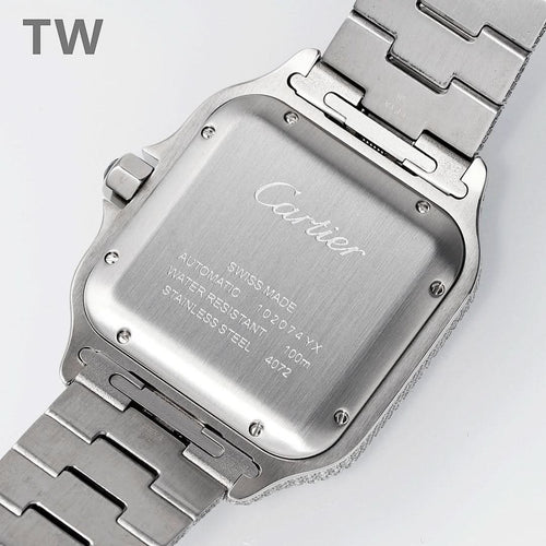 Cartier watch case with engraved backplate and metal bracelet links.