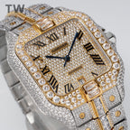 Cartier watch angled view with diamond bezel, Roman numerals, and gold center frame.