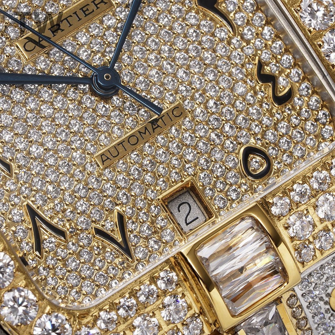 Cartier jeweled dial close-up with Automatic text and gold markers