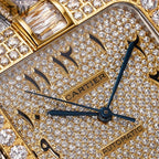 Cartier diamond dial close-up with gold bezel, black hands, and Cartier Automatic