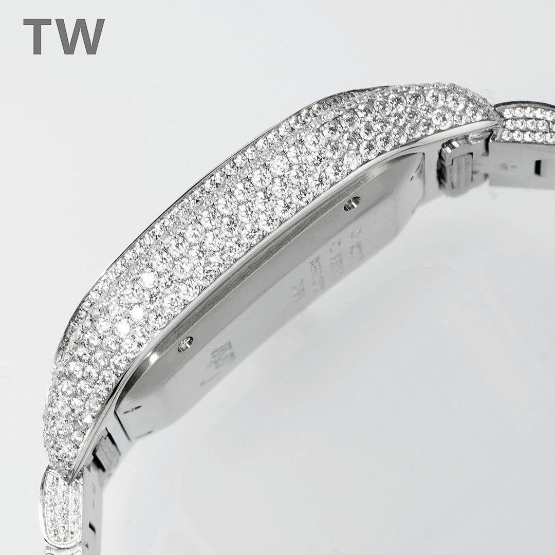Cartier watch case with dense diamond bezel and polished inner panel, side close-up.