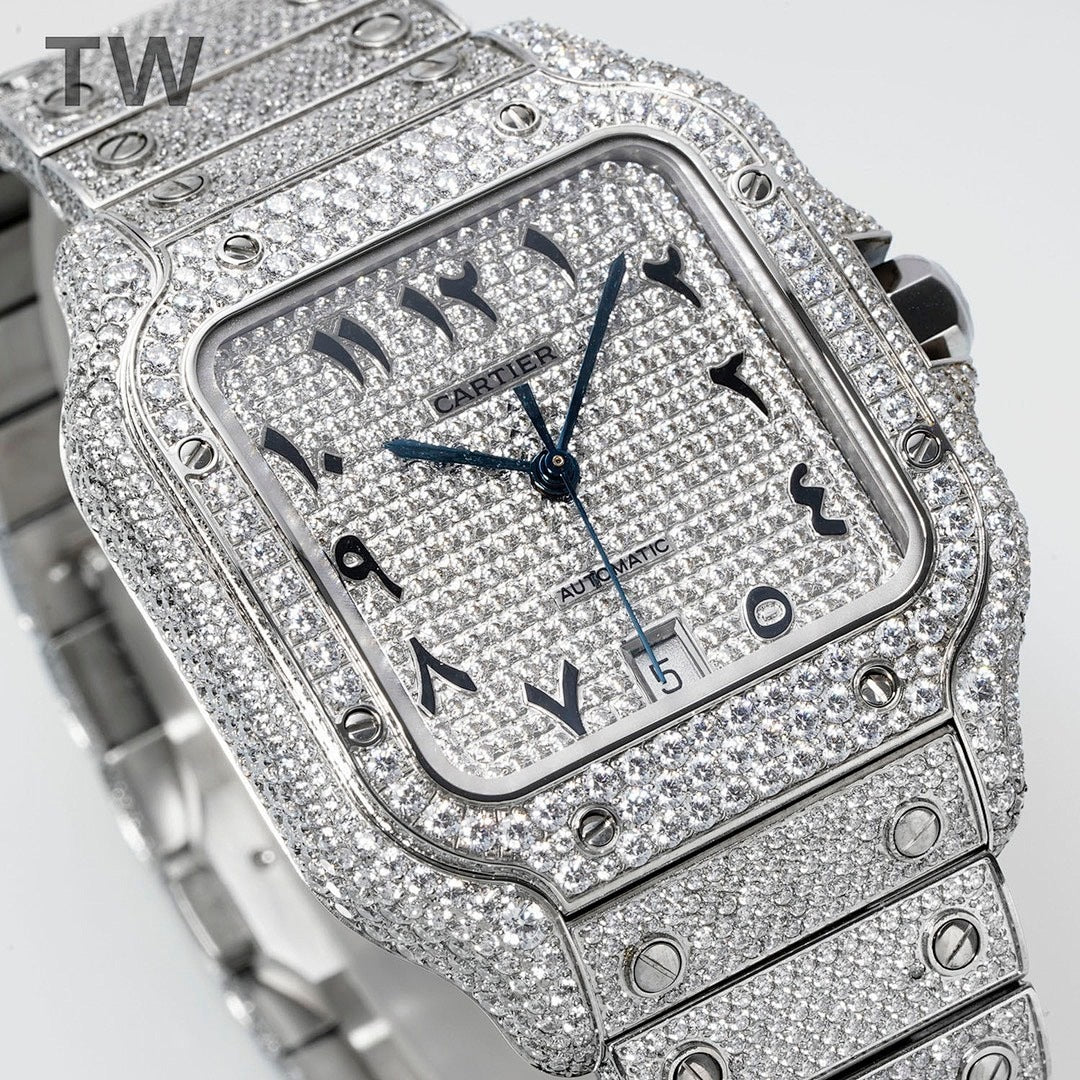 Cartier watch with diamond bezel, blue hands, black numerals, and metal link strap.