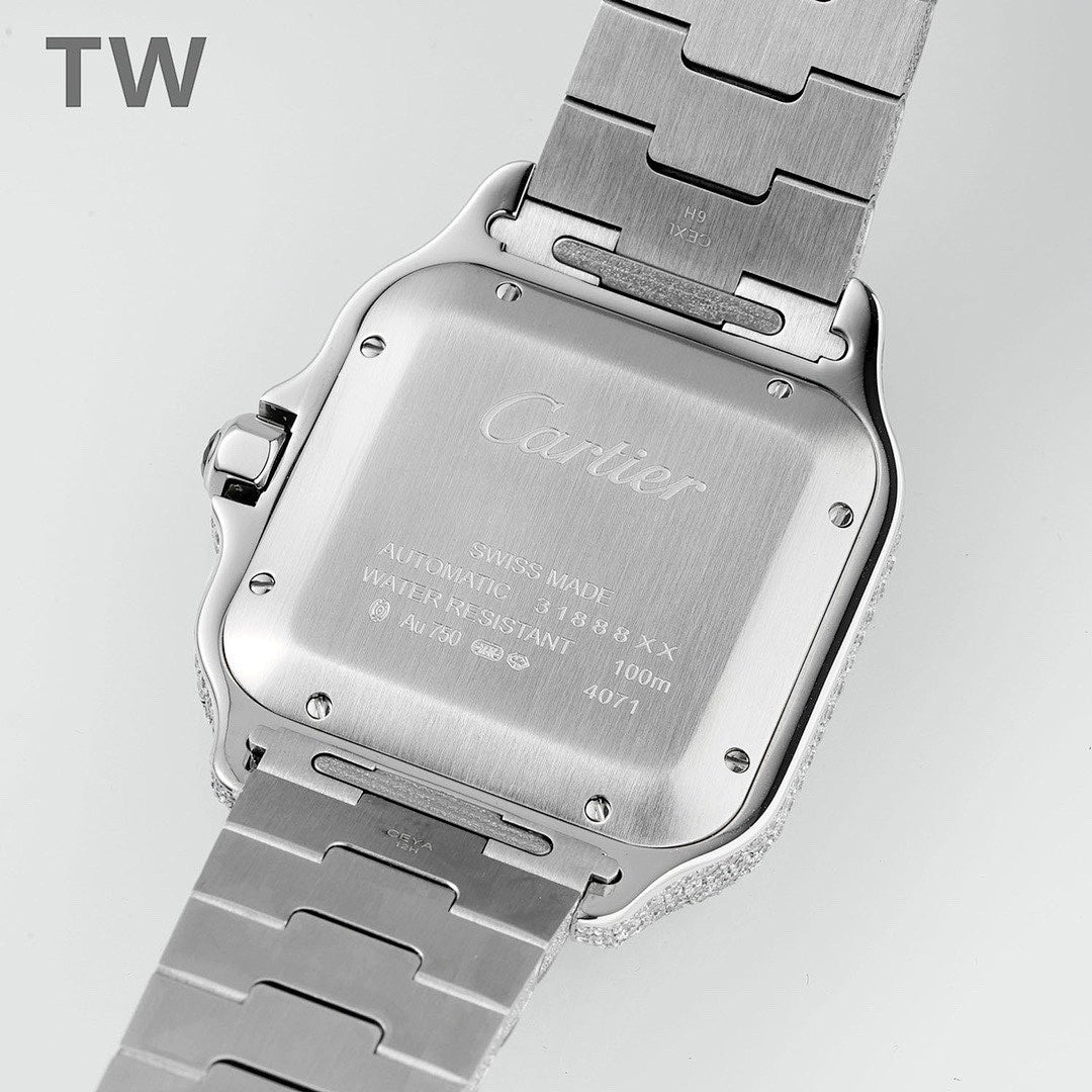 Silver-toned watch case with engraved back and metal link bracelet