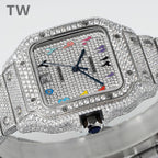 Diamond watch face close-up with multicolor hands, date window, and blue bezel stone