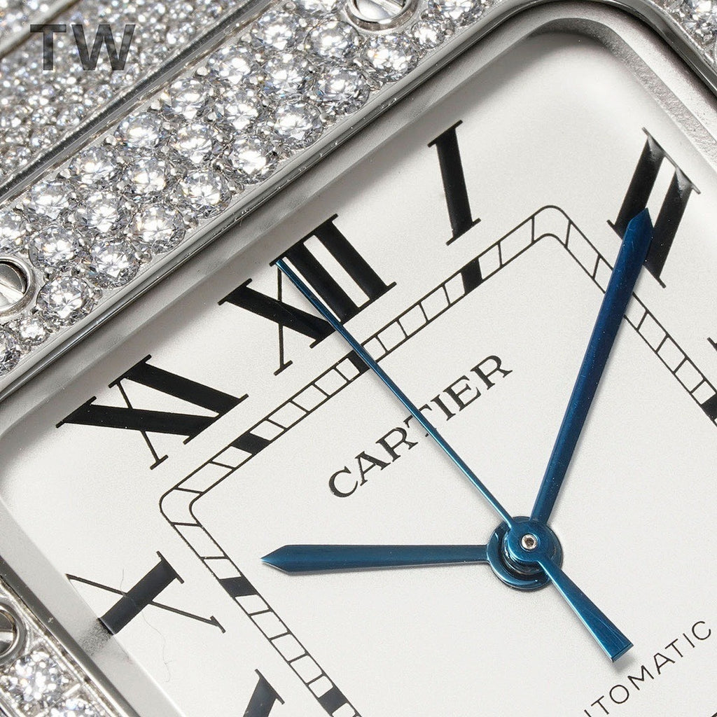 Close-up Cartier watch face with Roman numerals, blue hands, and date window