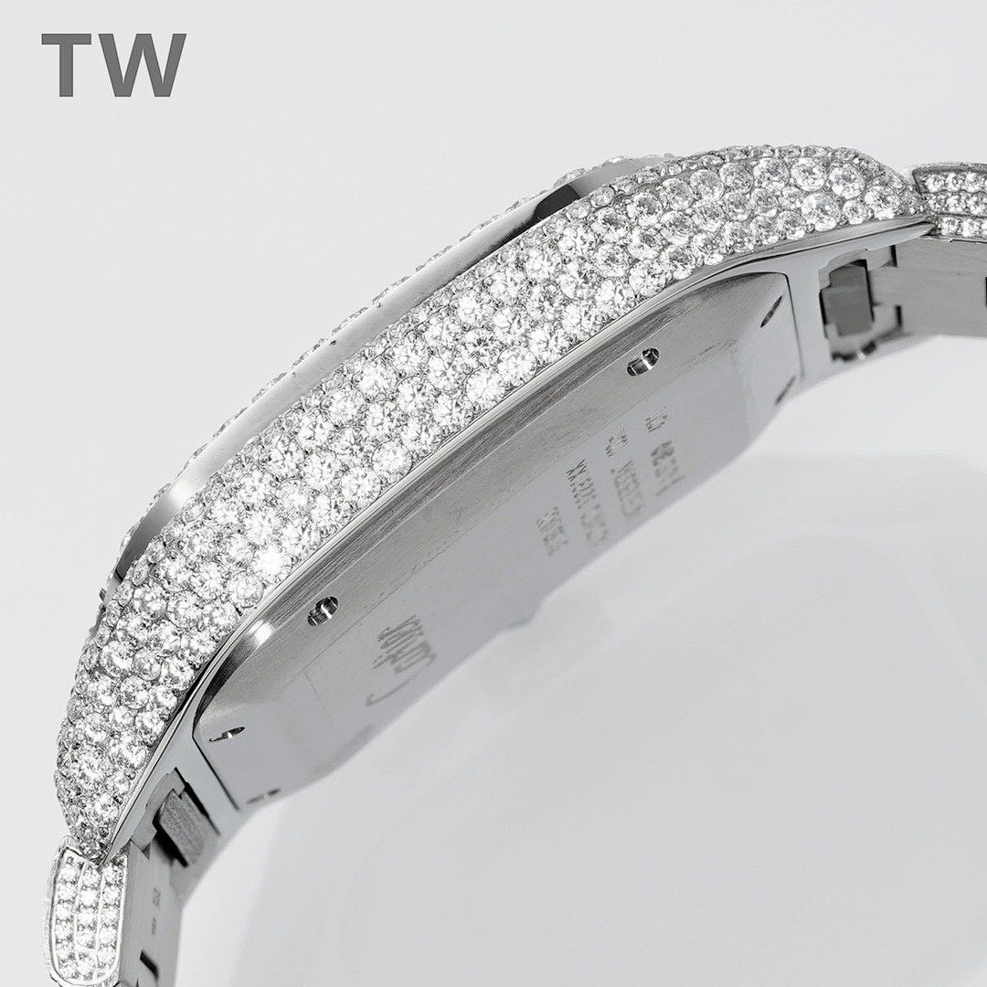 Cartier diamond-set watch case back with engraved markings on silver bracelet