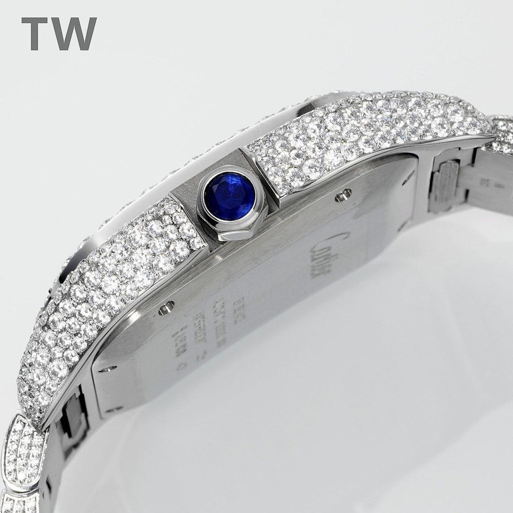Cartier diamond-set watch back with visible blue gemstone detail on crown