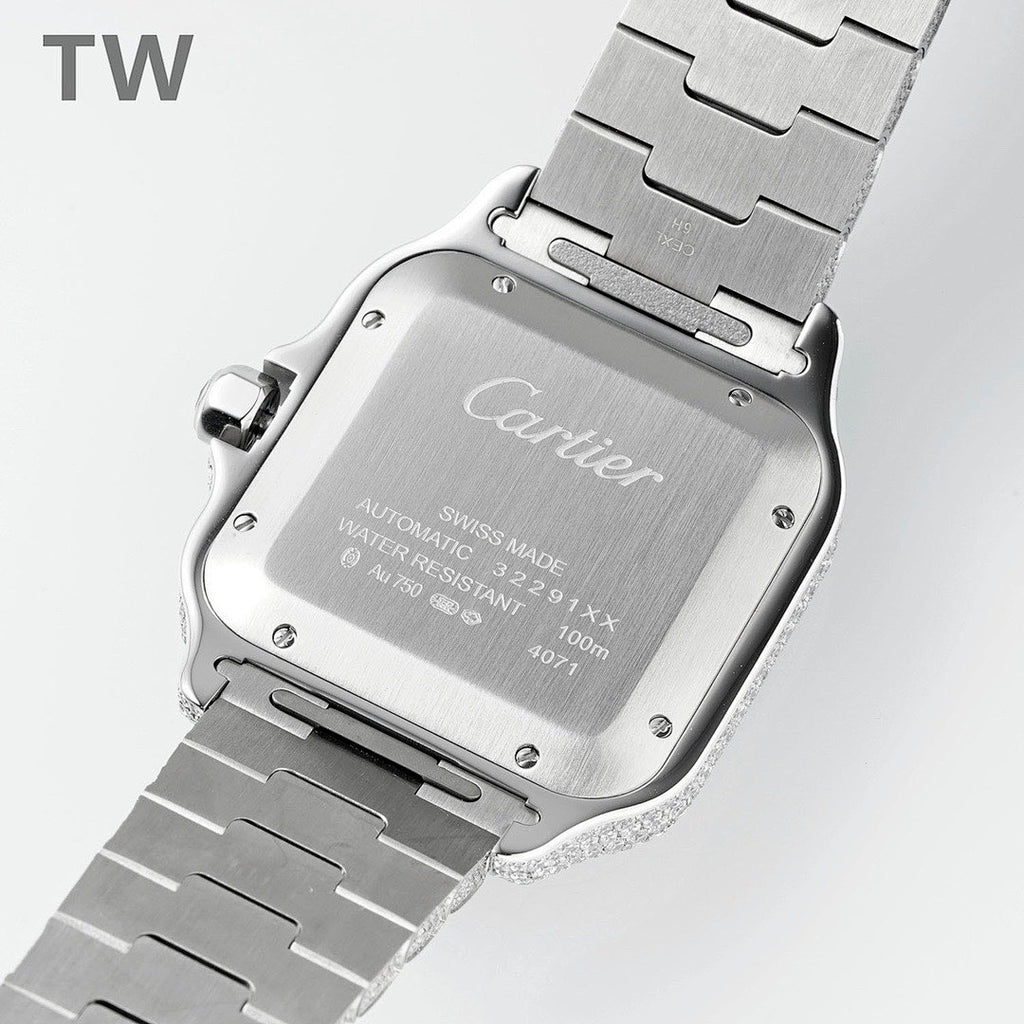 Engraved back of Cartier diamond watch with metal link bracelet
