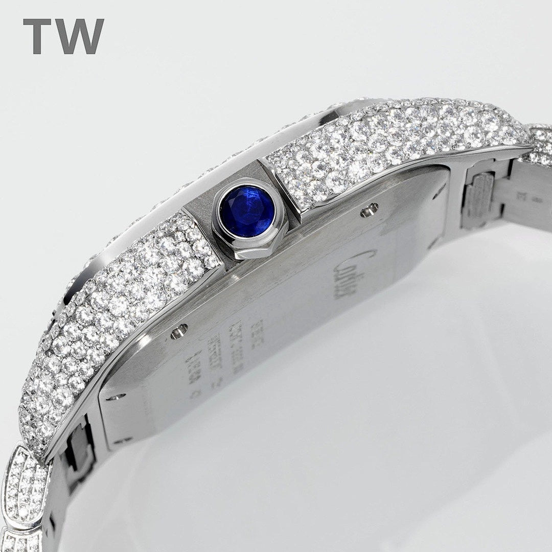 Diamond-set Cartier watch crown with blue gemstone on case