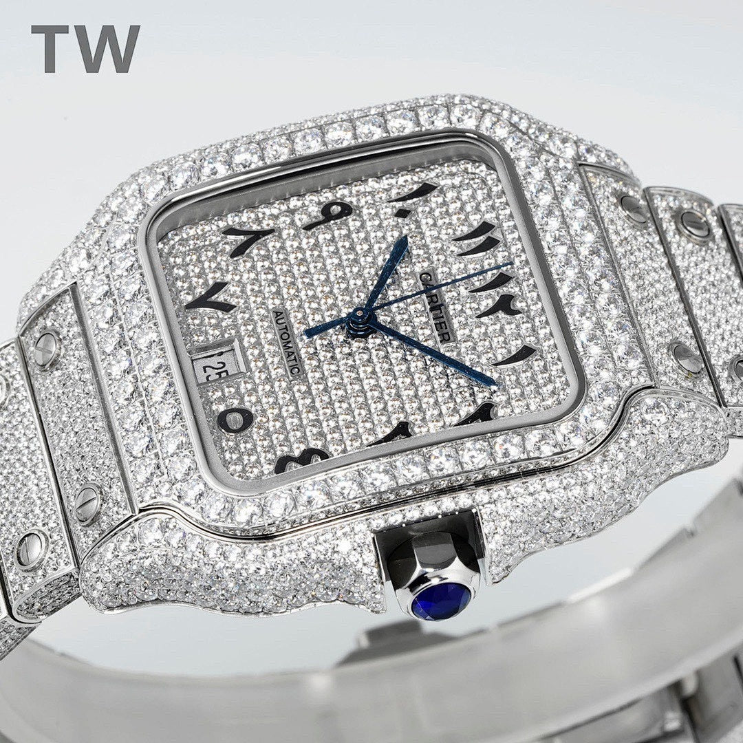 Diamond Cartier watch with blue dial, roman numerals, and bracelet links
