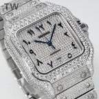 Diamond Cartier watch with blue dial, date window at 25, and bracelet links