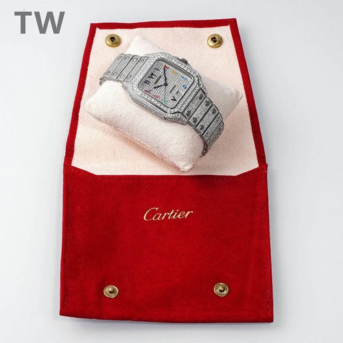 Diamond-studded rectangular wristwatch resting in a red jewelry pouch