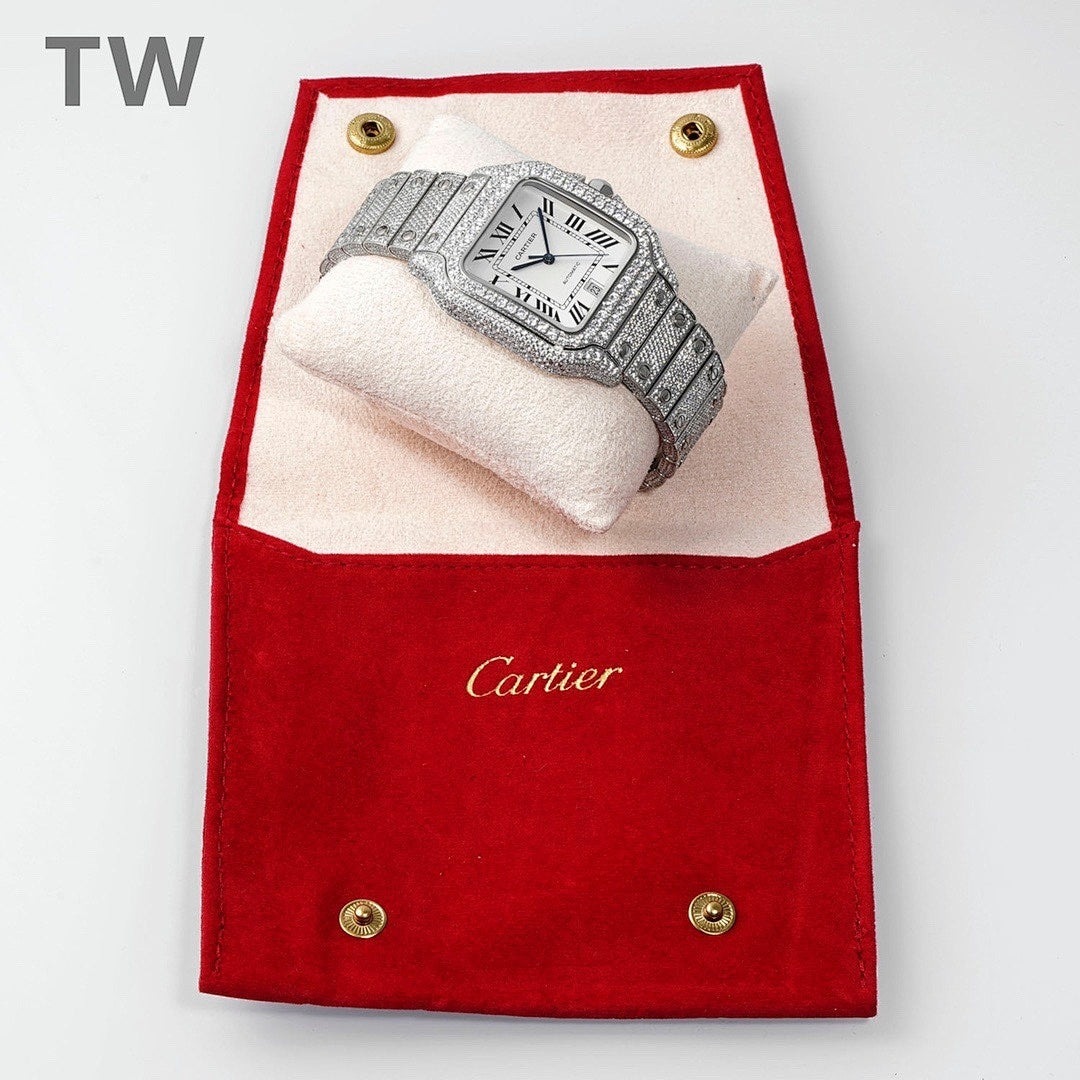 Cartier diamond wristwatch on a red presentation pouch with white cushion