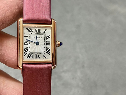 Rectangular wrist watch with burgundy leather strap and gold case, white Roman dial