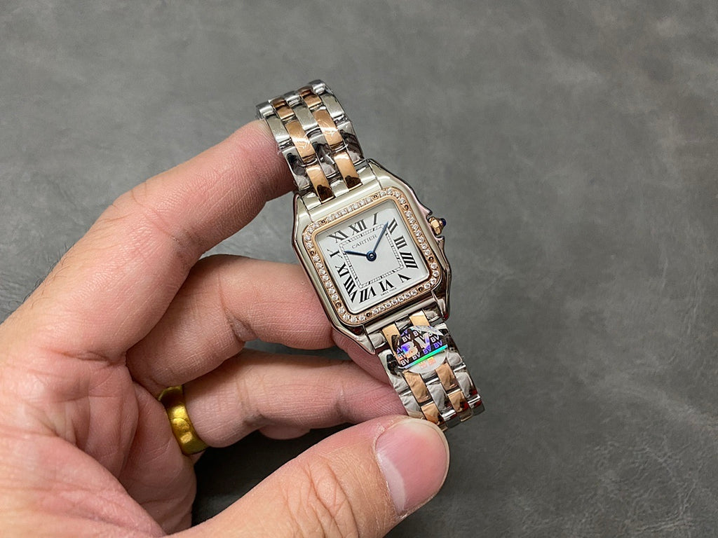 Two-tone square dial wristwatch with Roman numerals and diamond bezel, front view