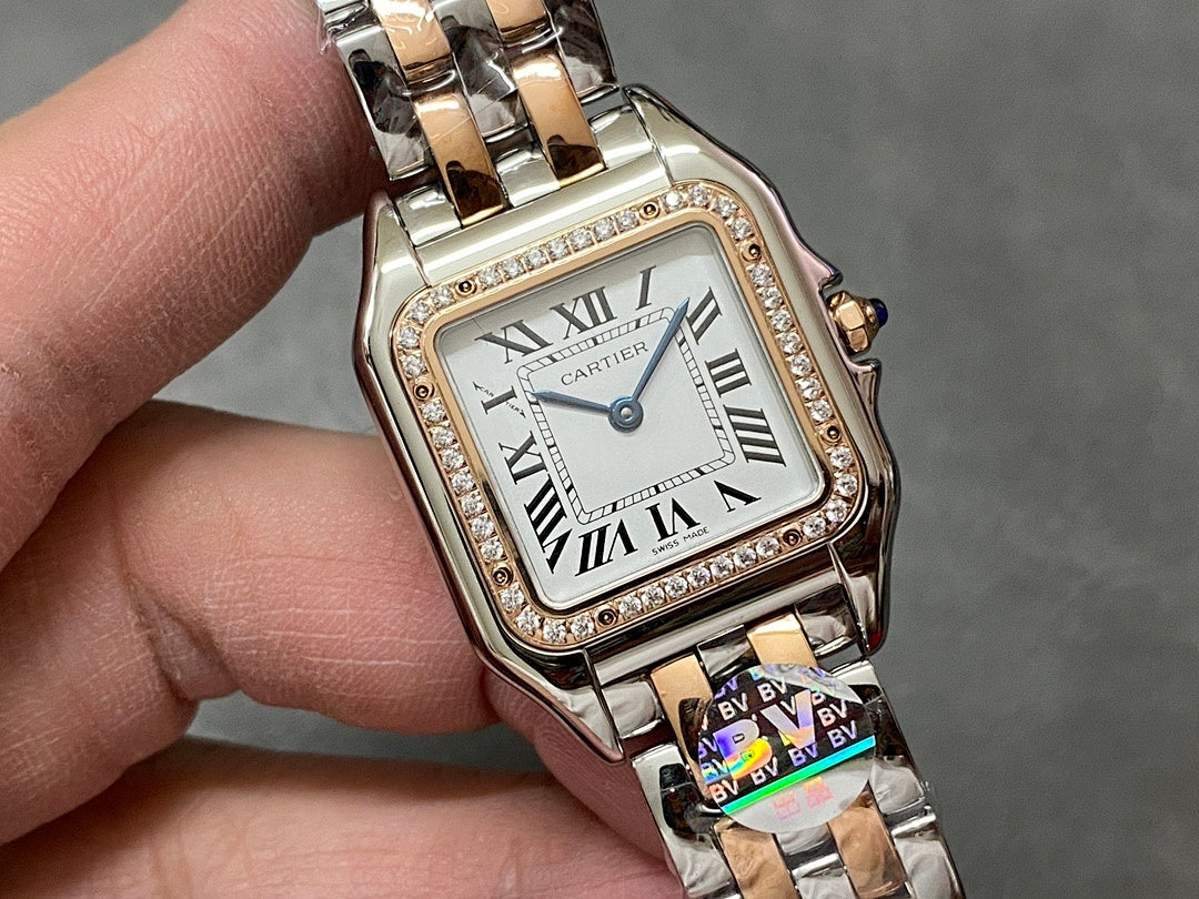 Two-tone wristwatch with square silver dial, Roman numerals, and diamond-studded bezel