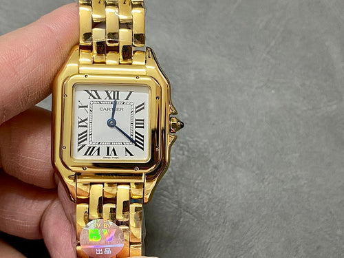 Gold Cartier watch with Roman numeral dial and gold bracelet, angled front view.
