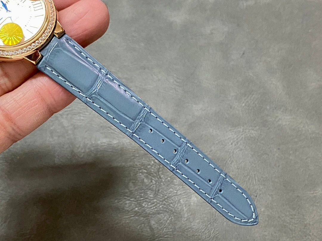 Blue leather watch strap with stitched edge and buckle end