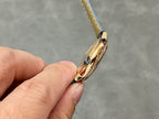 Cartier watch crown side in gold tone on blue leather strap