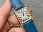 Cartier rectangular watch with blue strap, white dial, and blue-tone second hand