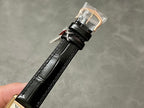 Cartier watch black leather strap with clasp and gold-toned hardware