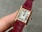 Cartier tank watch with burgundy leather strap and gold-tone rectangular case