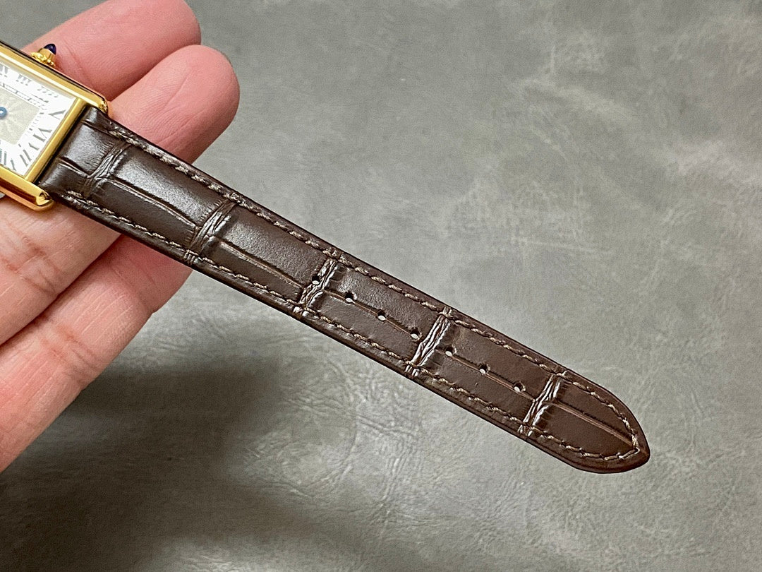 Cartier watch brown leather strap with stitched buckle and clasp end