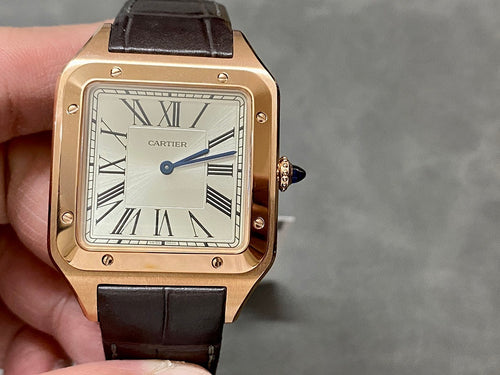 Cartier Santos watch front view with rose-gold case, black leather strap, Roman dial.