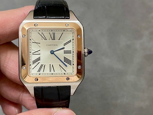 Cartier watch with rose gold-tone square case and black leather strap, Roman numeral dial