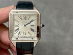 Cartier rectangular watch on hand; black leather strap, Roman dial, silver case, crown.