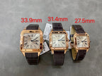 Cartier watches set with gold-tone square cases and black leather straps, white Roman numeral dials