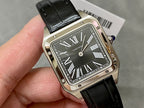 Cartier watch close-up, black leather strap and silver case with Roman numeral dial