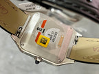 Cartier watch caseback with serial markings and leather strap, close-up view