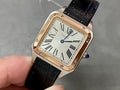 Cartier watch with black leather strap and rose gold-tone square case, silver dial