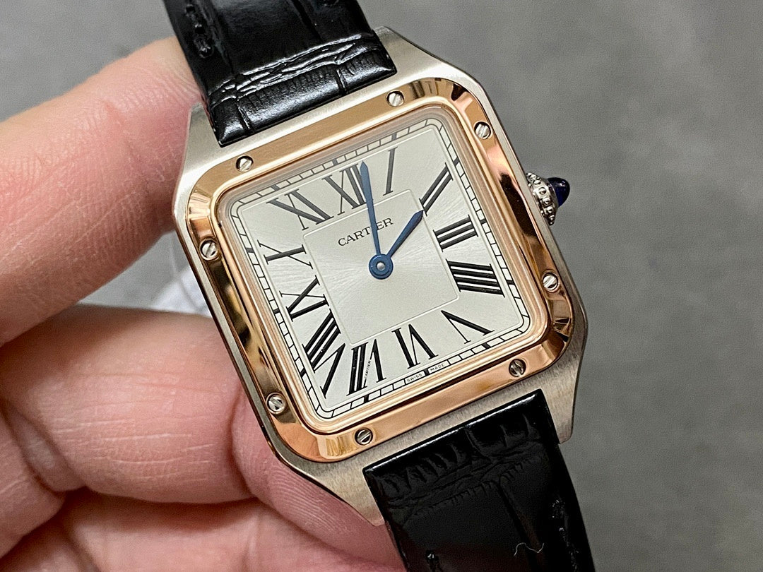 Cartier watch close-up with black leather strap, rose gold-tone square case, silver dial