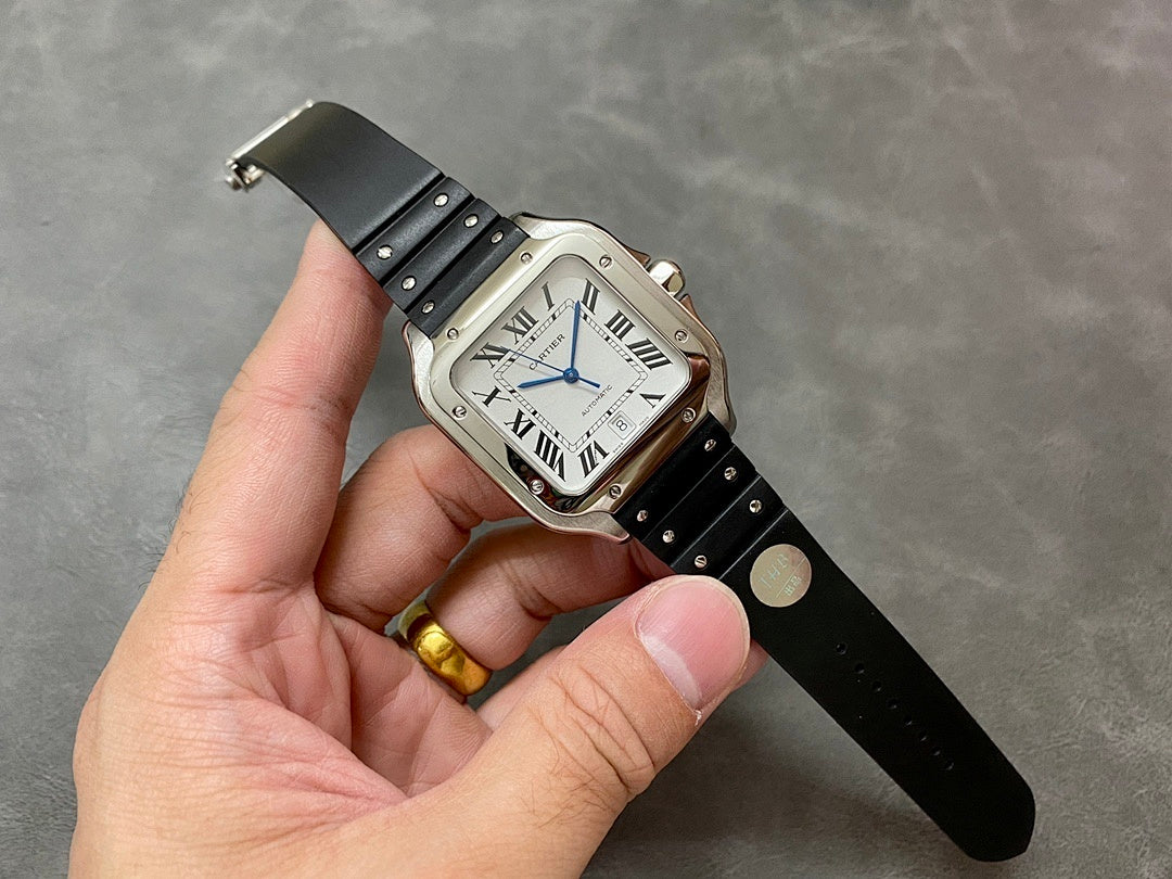Cartier wristwatch on hand, black leather strap and silver-toned square case with Roman numerals