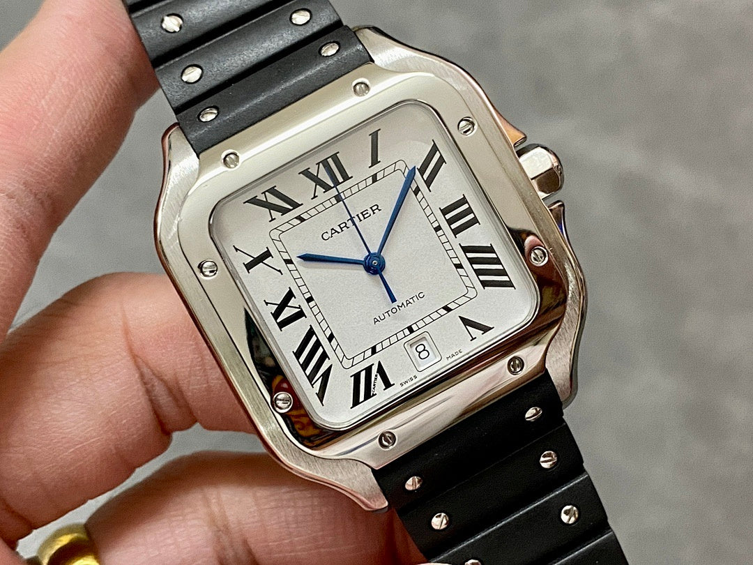Cartier wristwatch dial close-up with Roman numerals, blue seconds hand, and date window