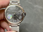 Cartier automatic wristwatch with black dial, Roman numerals, steel bracelet and crown